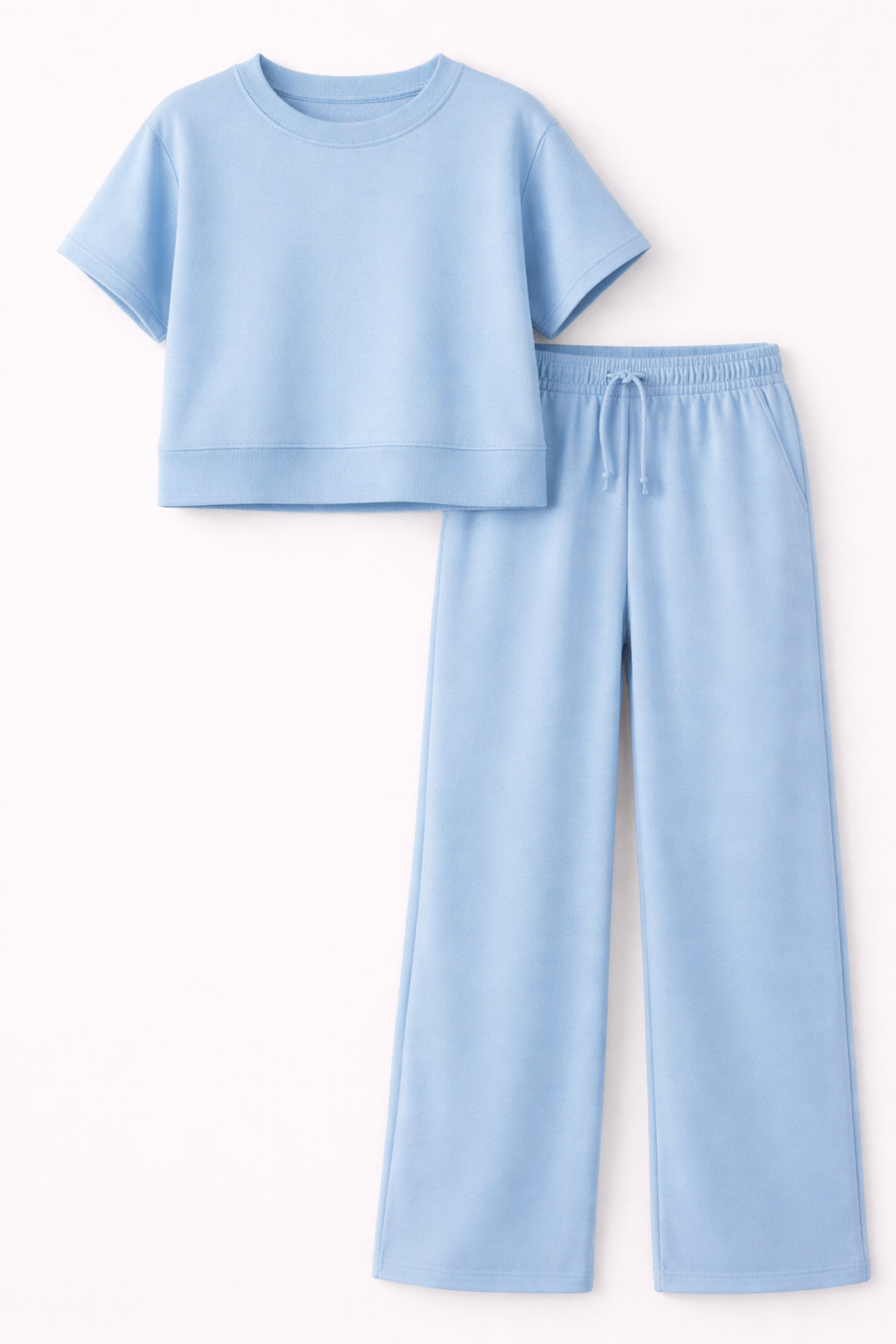 Light blue t-shirt and pants set on a white background