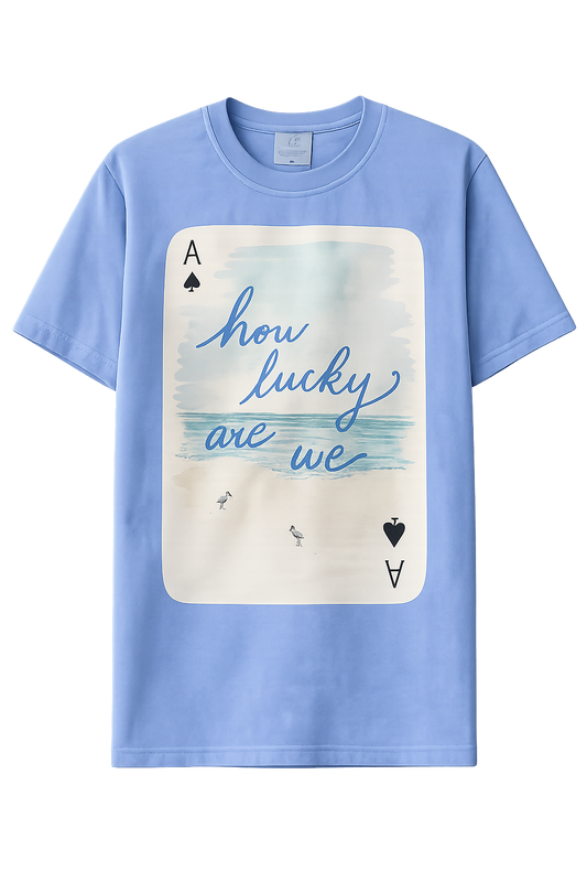 Light blue t-shirt with a graphic design and text on a white background